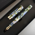 Deep bath green metal ballpoint pen with three removable tips: fine, medium, and graphic.