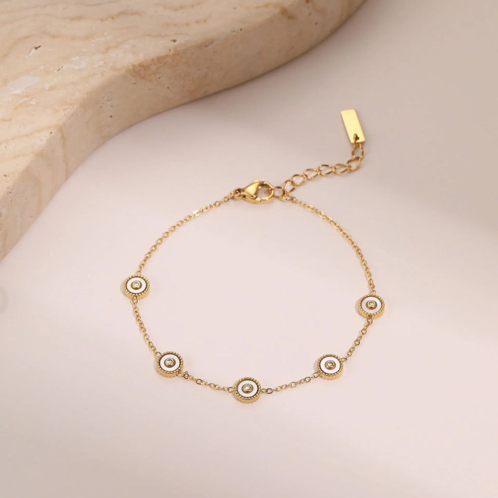 Women's stainless steel bracelet and necklace set with electroplated 18K gold finish in geometric design