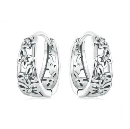 Sterling silver hollow butterfly earrings with zircon accents measuring 14mm by 5mm