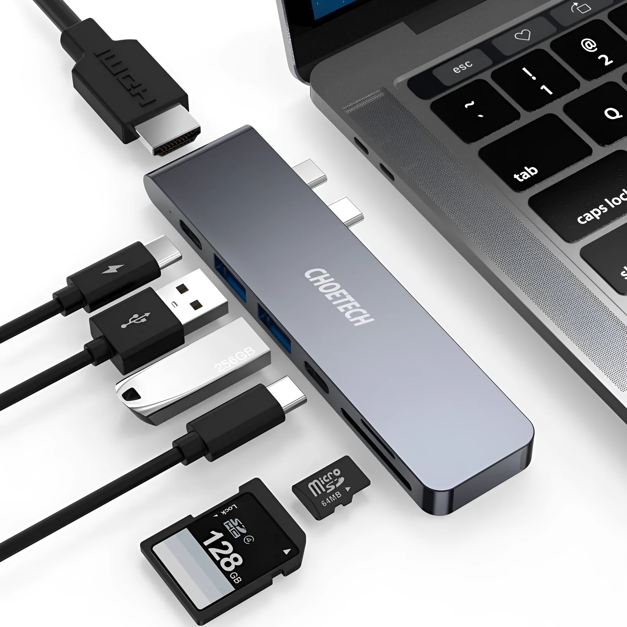 USB-C multiport adapter with Thunderbolt 3, HDMI, SD card slots, and USB ports in aluminium alloy case