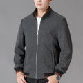 Men's grey sports-style fleece jacket with long sleeves and side pockets.