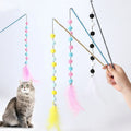 Cat teaser wand toy with plush ball, feathers, and plastic rod, about 31 cm long, random colour