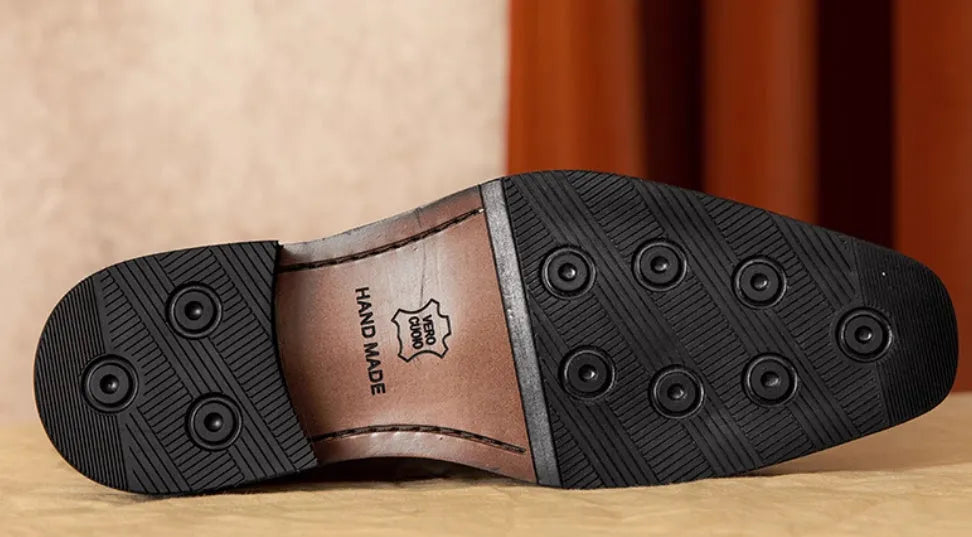 Men's black genuine leather slip-on loafers with fringed detail and rubber sole