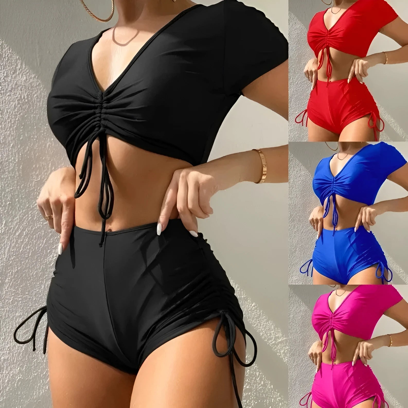 Women's two-piece swimsuit with lace-up front top and matching shorts in polyester material.