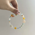 Orange sea coloured alloy bracelet with crystal beads and diamond pendant for women