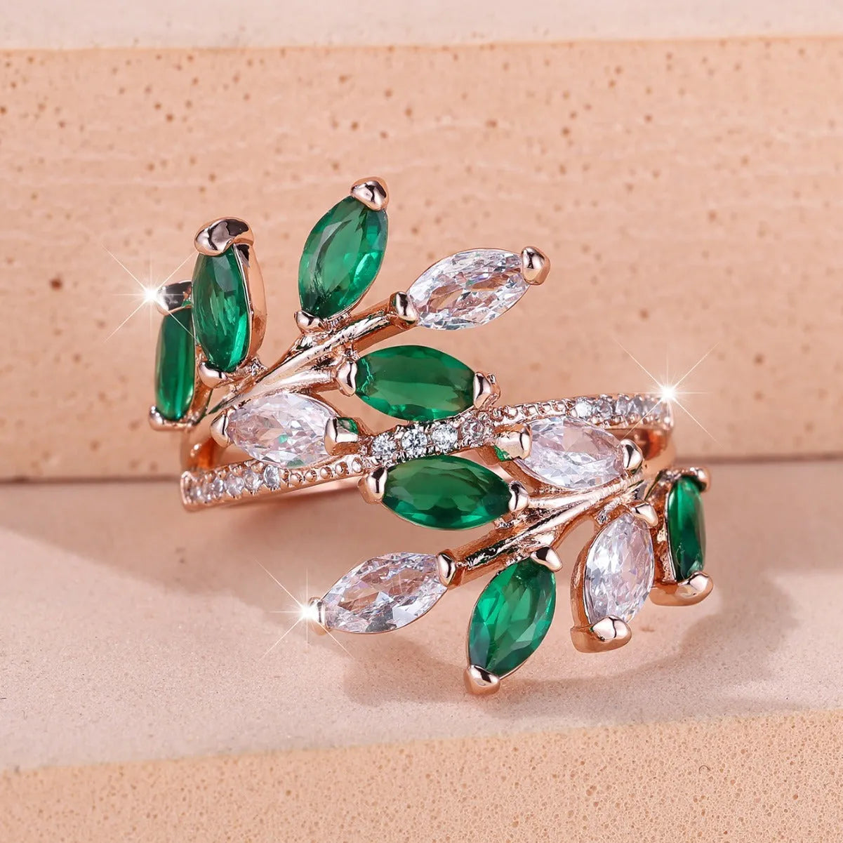 Adjustable copper leaf ring with zircon stones in multiple colour options including sapphire blue and white diamond