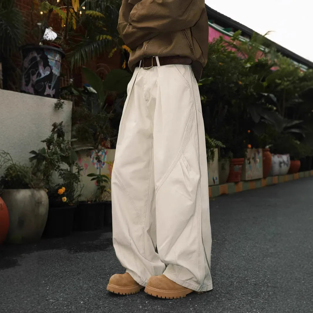Men's straight leg trousers in striped black, brown and apricot colours with elasticated fabric
