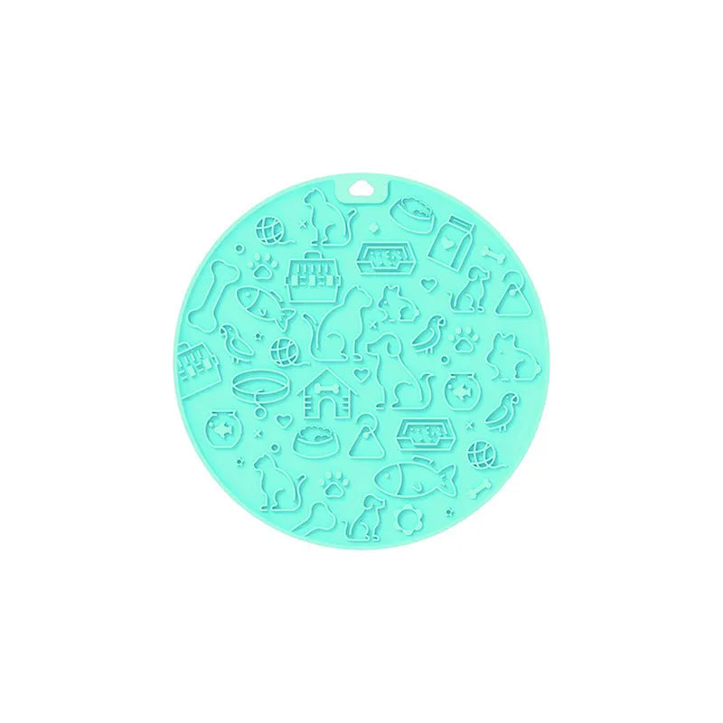 Round blue silicone pet licking mat with textured surface and a suction cup on the base.