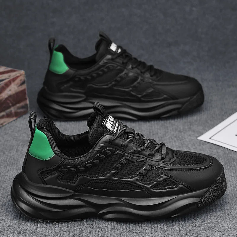 Men's solid colour breathable mesh sports shoes with round toe in white or black.