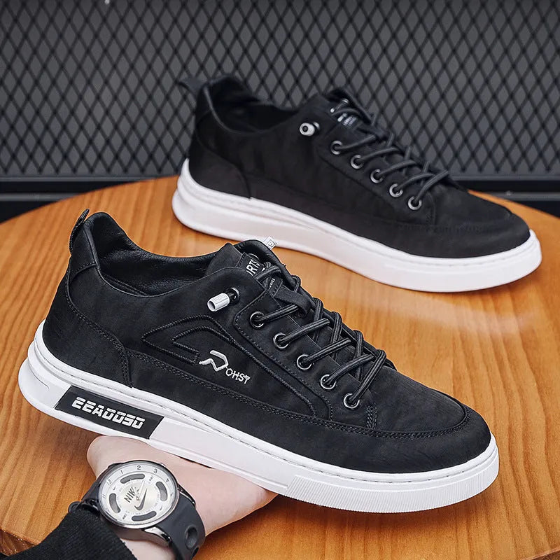 Grey men's canvas sneakers with round toe and lace-up design