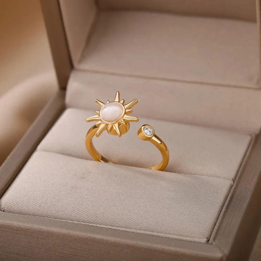 Gold and platinum electroplated copper rotatable ring with adjustable open mouth and geometric round shape