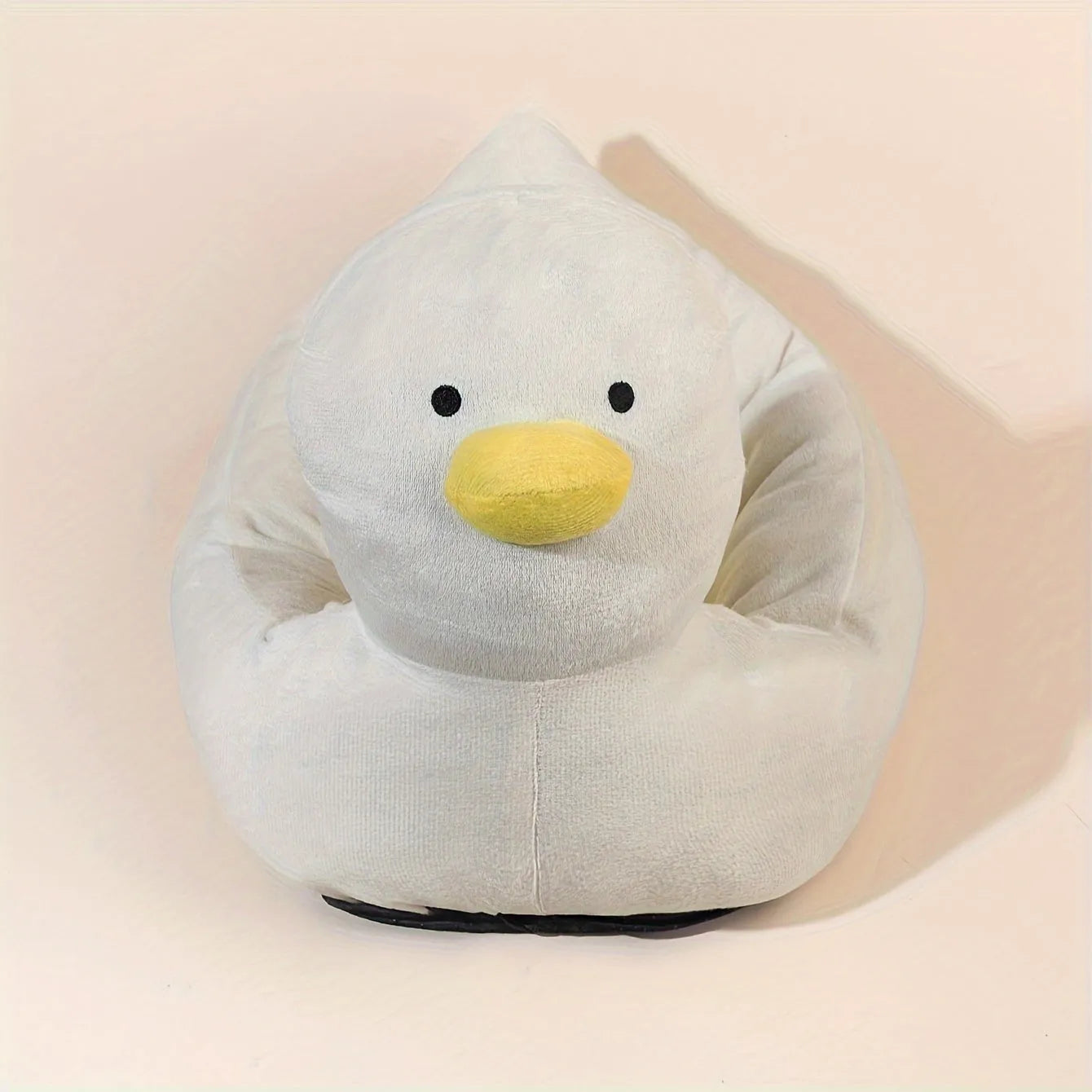 Blue duck-shaped fluffy pet bed sofa for small dogs and cats on floor