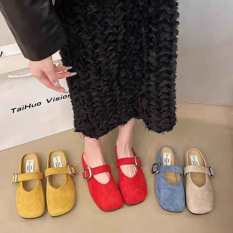 Women's flat closed toe half slipper in apricot colour with square toe and rubber sole.