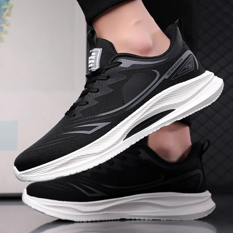 Men's low-top casual sneakers in fly woven mesh with rubber sole, shown in black colour.