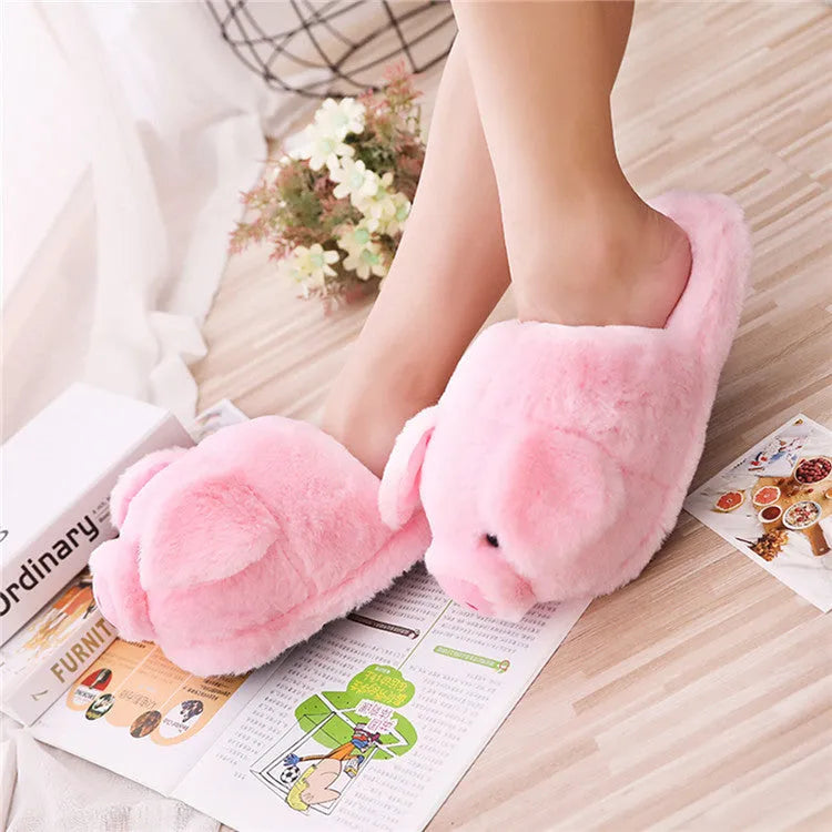 Pink pig-themed plush floor slippers with soft short fabric and cotton filling.