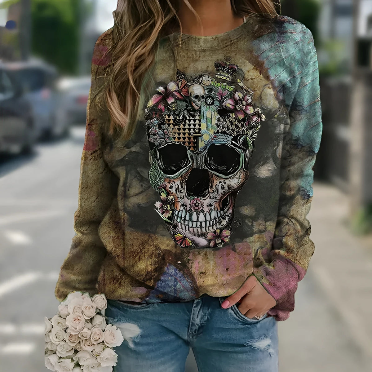 Black long sleeve sweatshirt with a white skull graphic print on the front