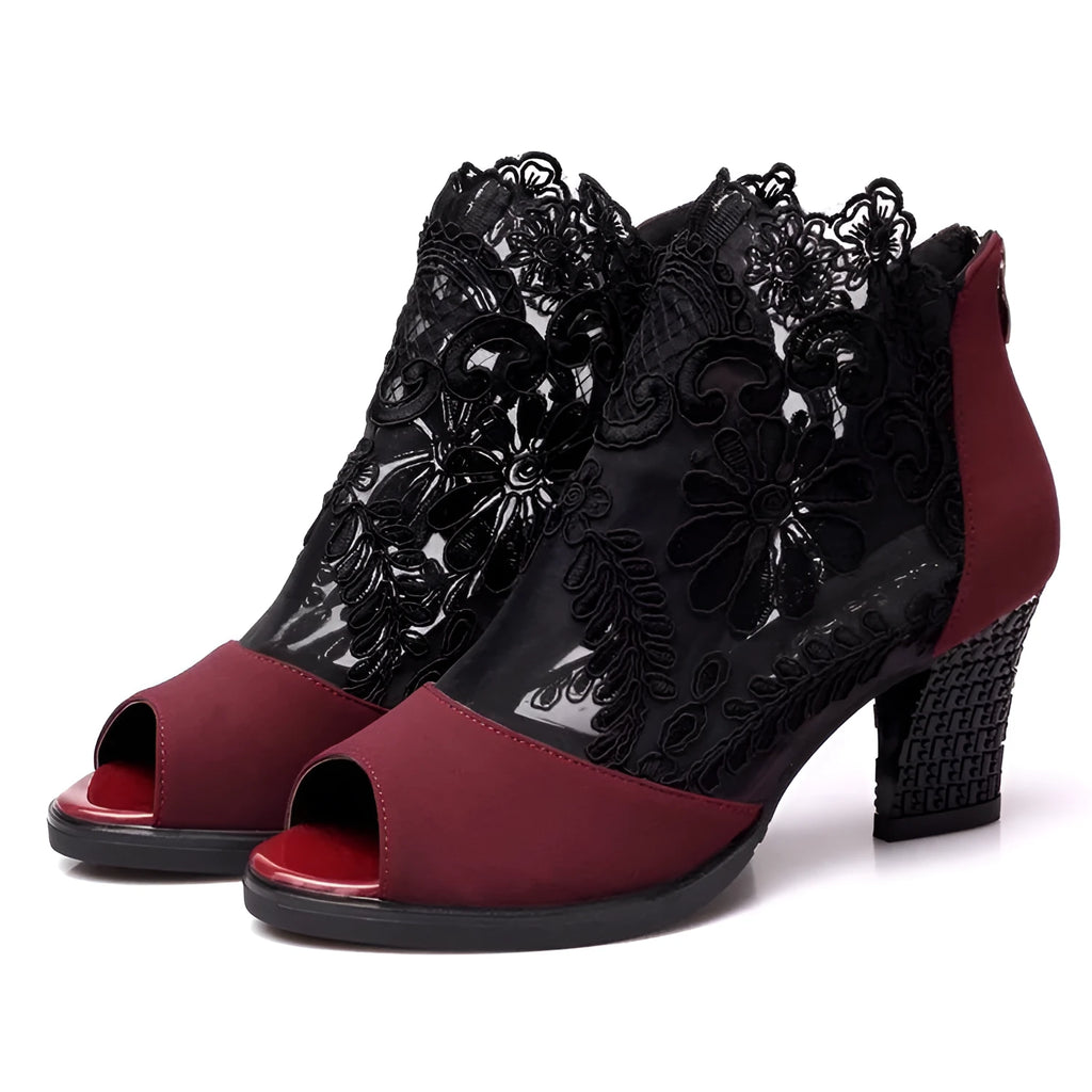 Women's black gladiator sandals with flower lace detailing, square heels, and zip closure