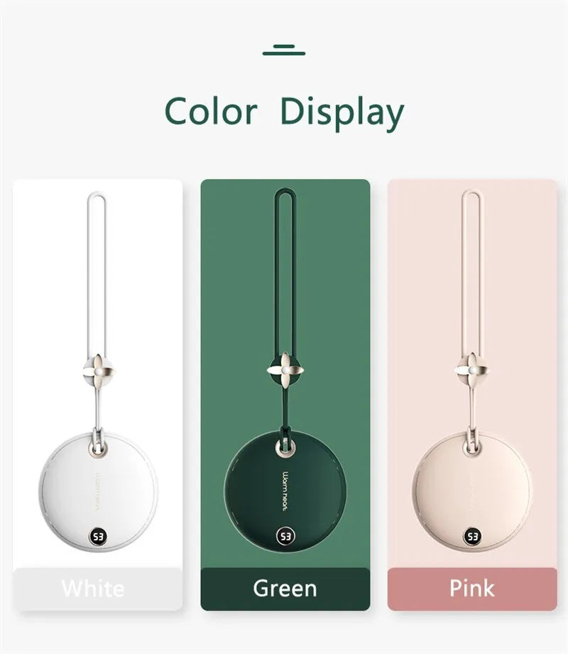 Green hand warmer power bank with digital display showing battery level, next to a charging cable.