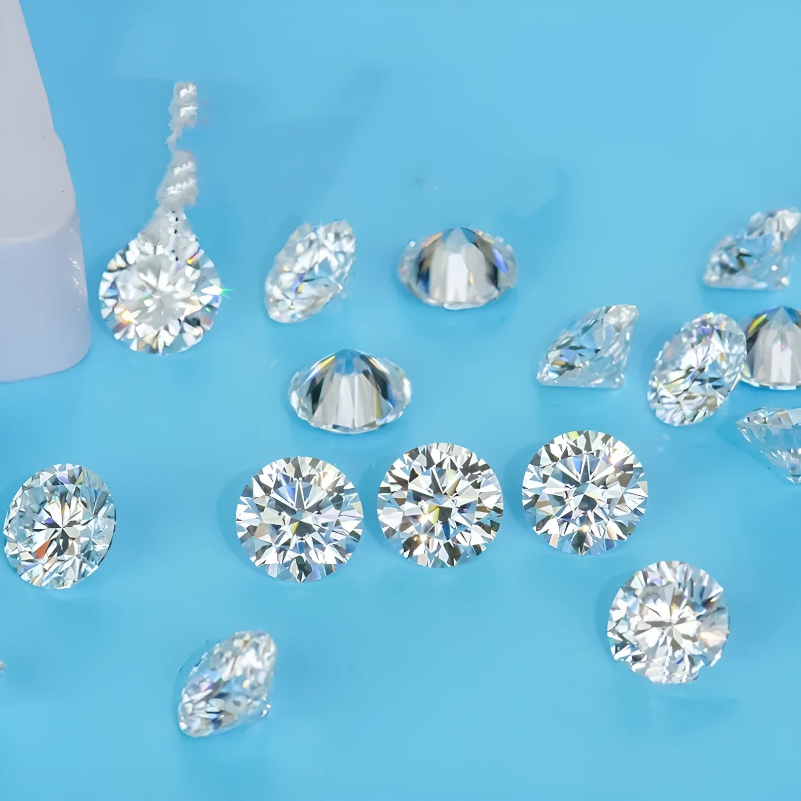 Round moissanite stone with eight hearts eight arrows cut showing polished surface and clarity