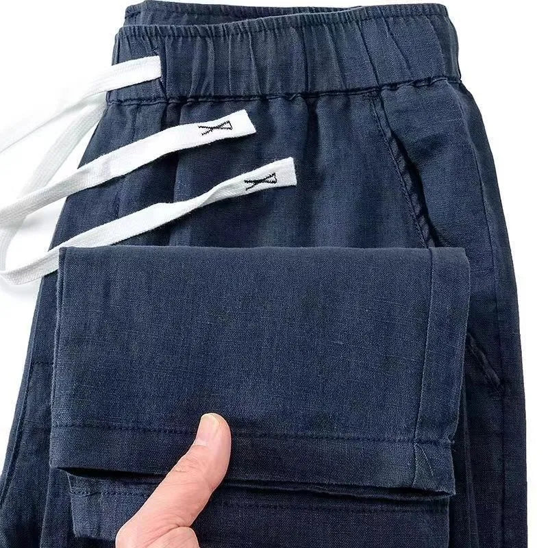 Pure linen Chinese-style straight leg trousers with elastic drawstring waist in multiple colours.