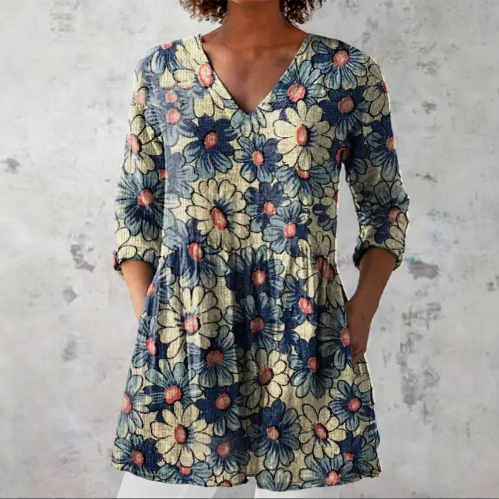 Women's retro style slim fit long-sleeved top with a printed design, shown on a hanger.