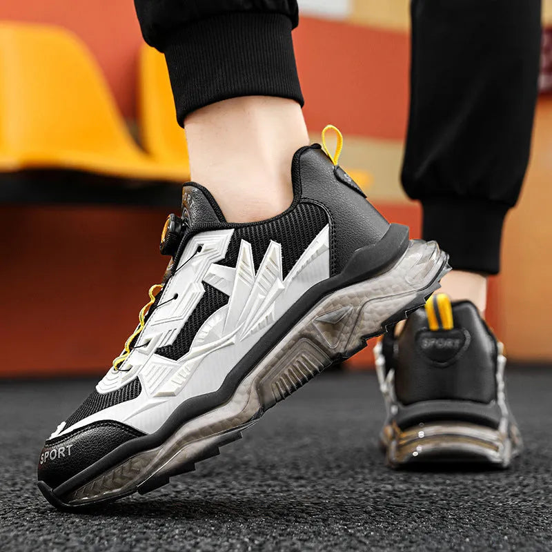 Men's black casual sneakers with rotating button closure and mesh upper on platform sole