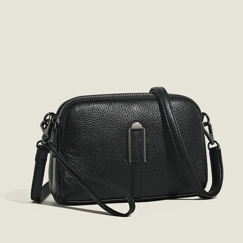Genuine leather women's square shoulder bag in black, shown with dimensions 19cm by 13cm by 6cm.