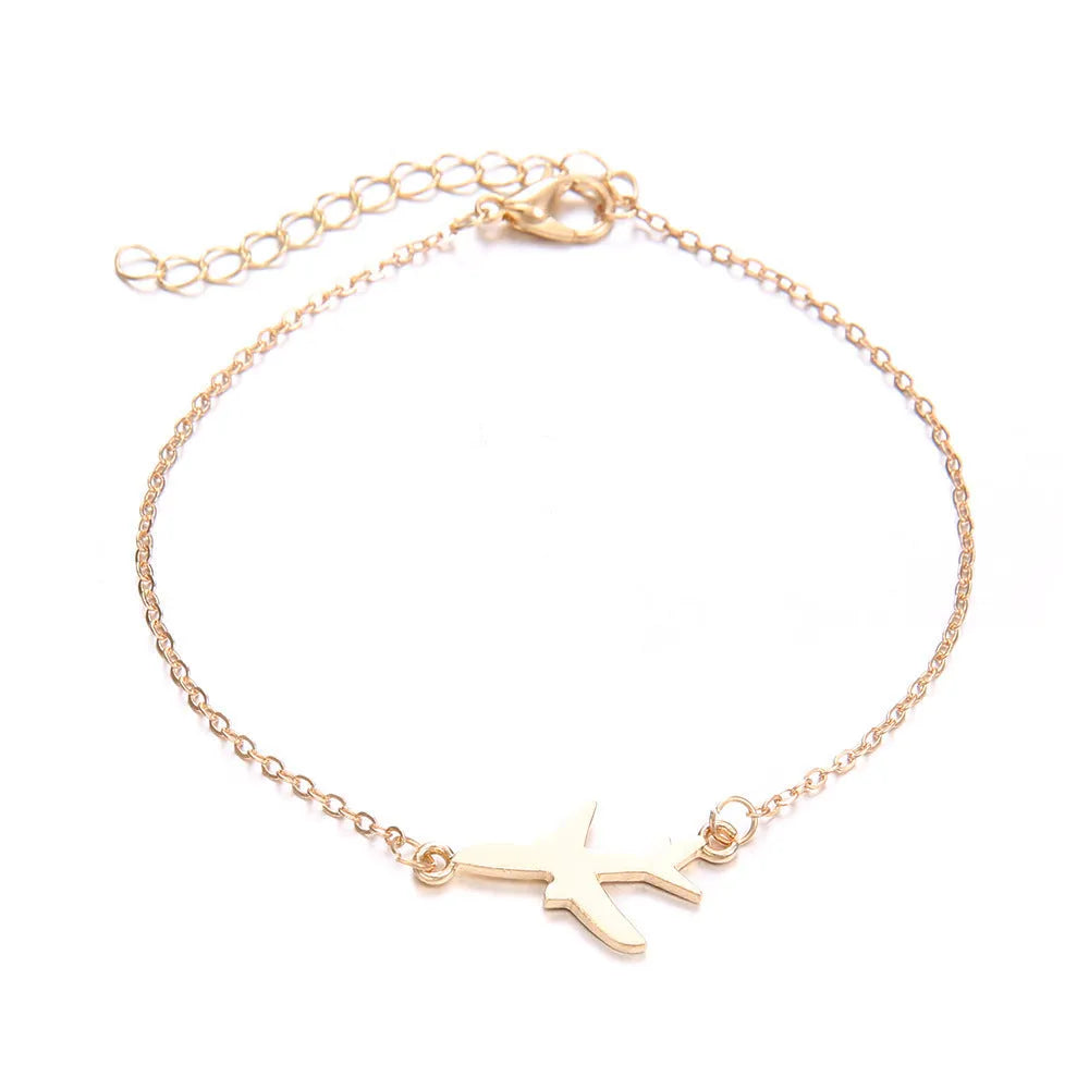 Three bohemian bracelets with heart-shaped aircraft map charms in alloy with electroplated finish