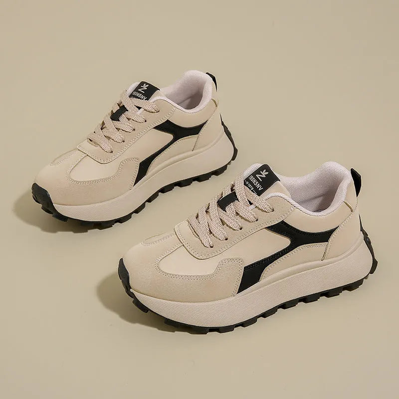 Women's solid colour low-top platform sports shoes with lace-up front and rubber sole.
