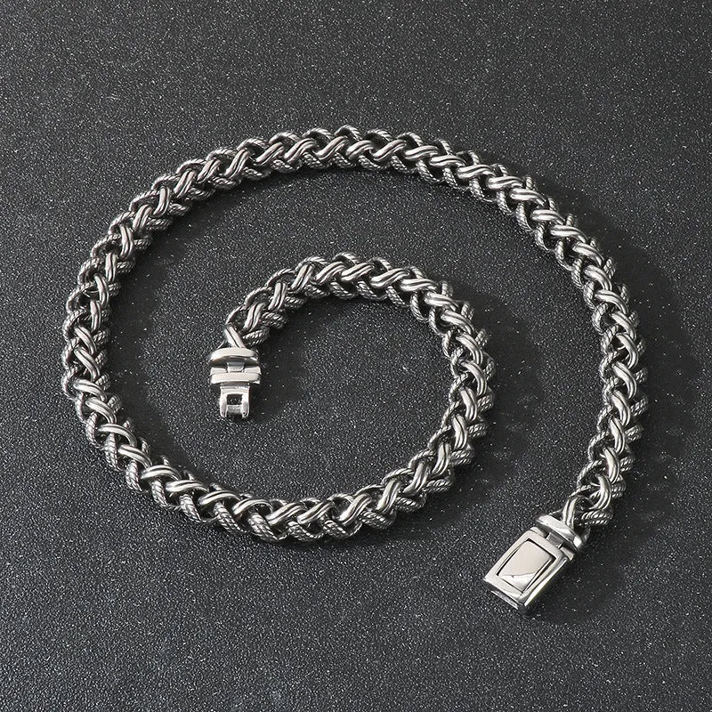 Men's titanium steel keel chain necklace in antique silver with large hemp flowers chain and geometric design.