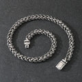 Men's titanium steel keel chain necklace in antique silver with large hemp flowers chain and geometric design.