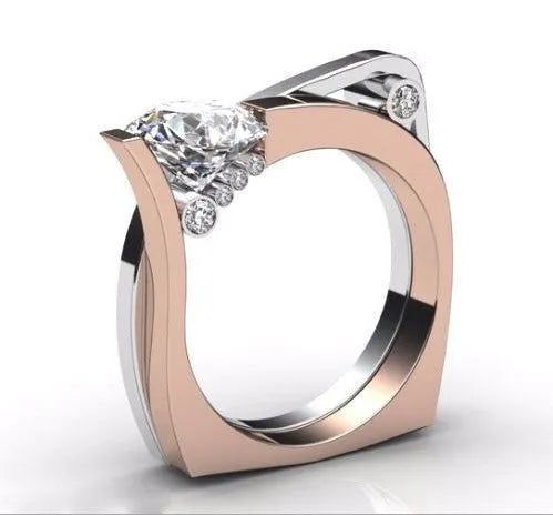Rose gold geometric couple rings with zircon stone inlays shown in women's sizes