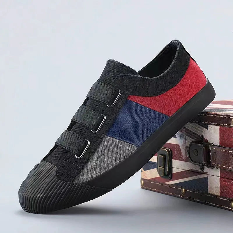 Men's low-top canvas sneakers in beige with an elastic band and vulcanised rubber sole.