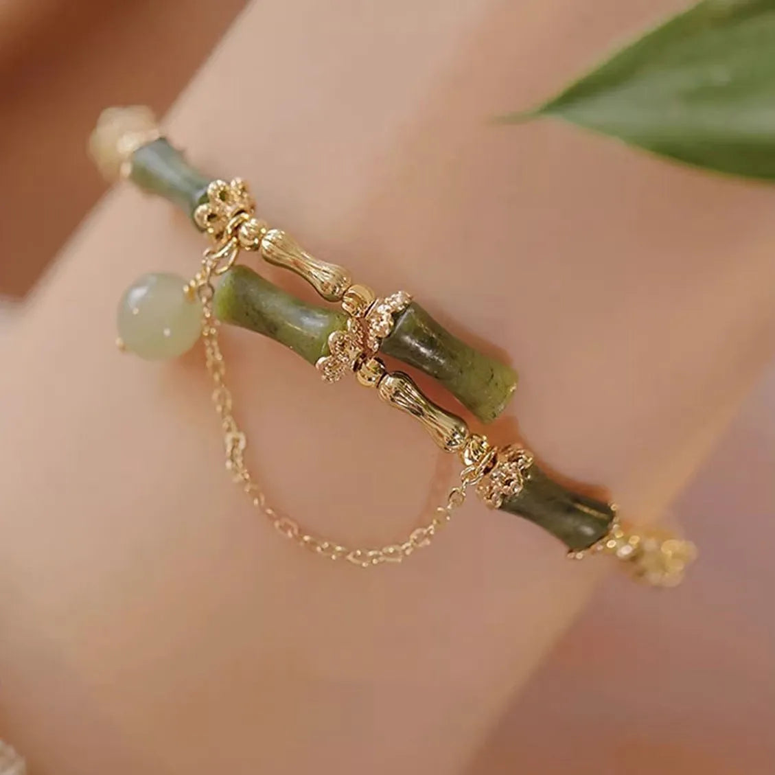 Women's bamboo joint bracelet in plum wine colour with coloured glaze beads