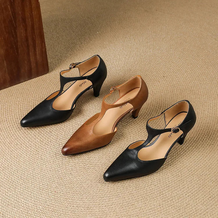Brown retro women's sandals with a T-strap buckle and a block heel.