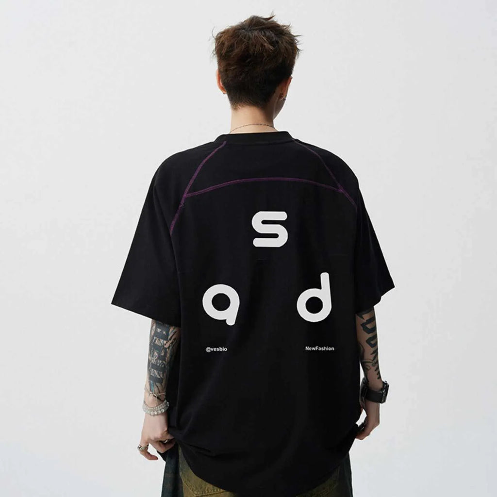 Loose fit cotton short sleeve t-shirt with letter print, shown in black and white colour options.
