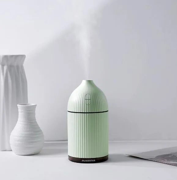 White ultrasonic aromatherapy diffuser with LED light and 300ml capacity for home use