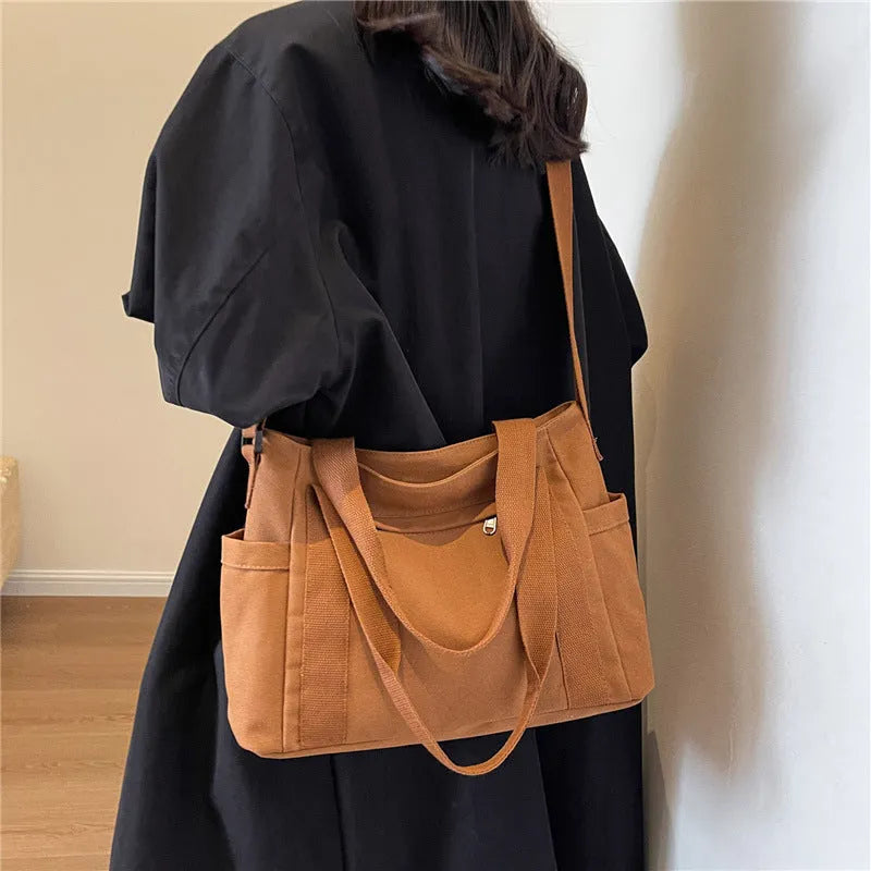 Women's large canvas shoulder tote bag with sandwich pockets and phone compartment in solid colour