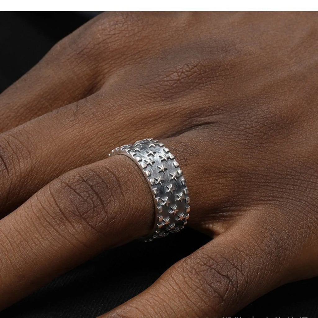 Pure silver ring with multiple five-pointed star patterns and adjustable opening