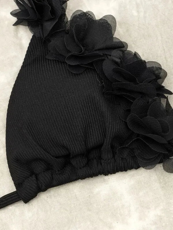 Black women's two-piece swimwear with gathered high-waist shorts and separate top