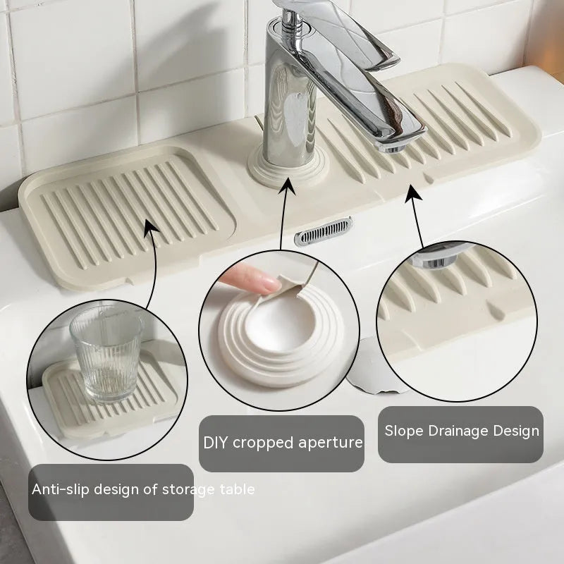 Silicone sink faucet pad in sloped design showing drainage channels, placed under a tap.