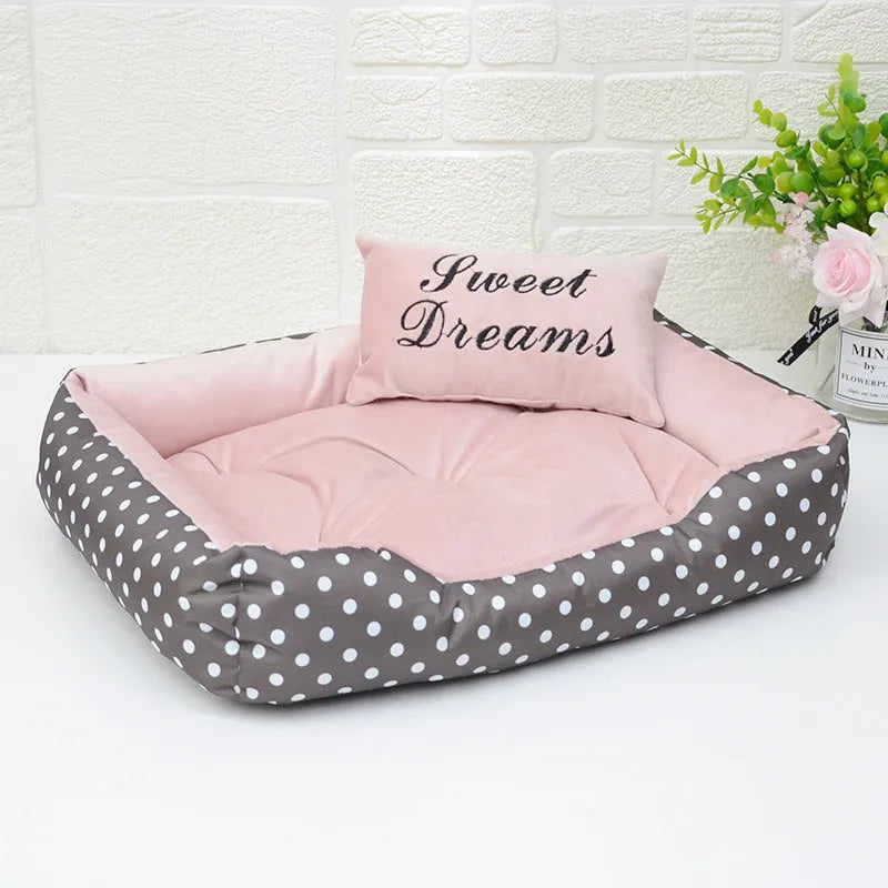 Polka dot print square dog bed with matching embroidered pillow in grey, blue, pink, or rose red.