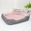 Polka dot print square dog bed with matching embroidered pillow in grey, blue, pink, or rose red.
