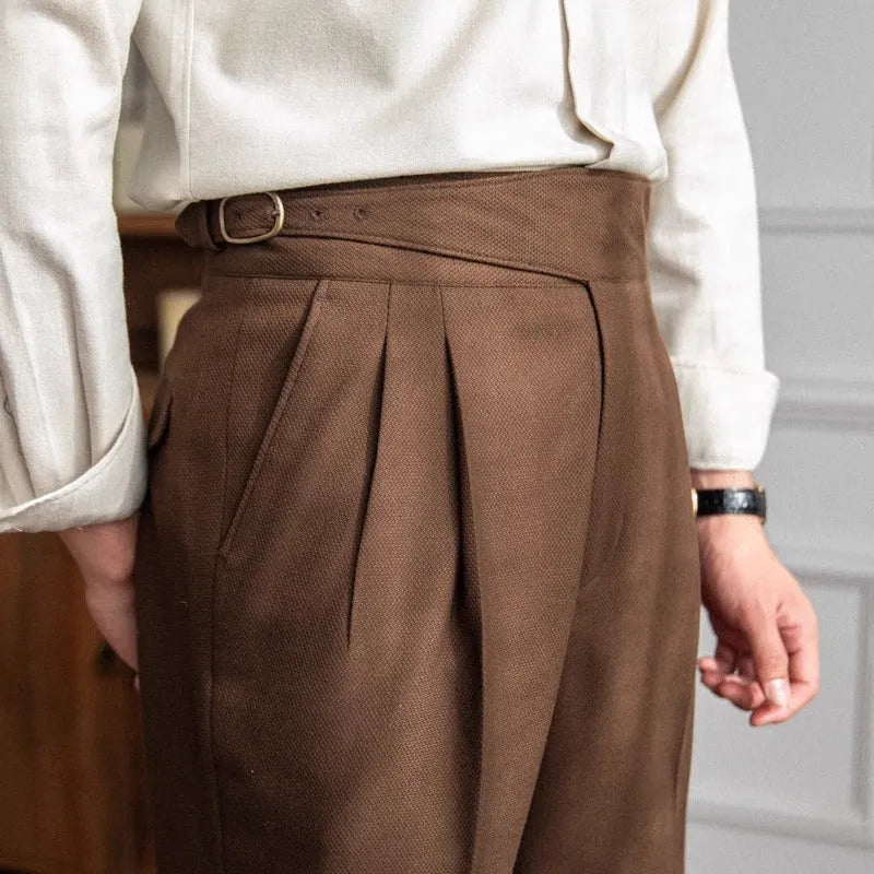 Men's high waist straight leg casual trousers in black polyester fabric on a hanger.