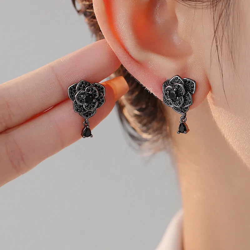 Black rose zircon floral stud earrings with electroplated copper construction and 18K purity finish