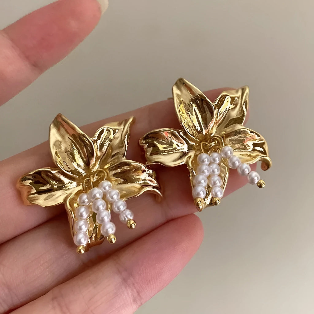 Gold H1795 personalised pearl flower earrings with exaggerated design and Seiko treatment