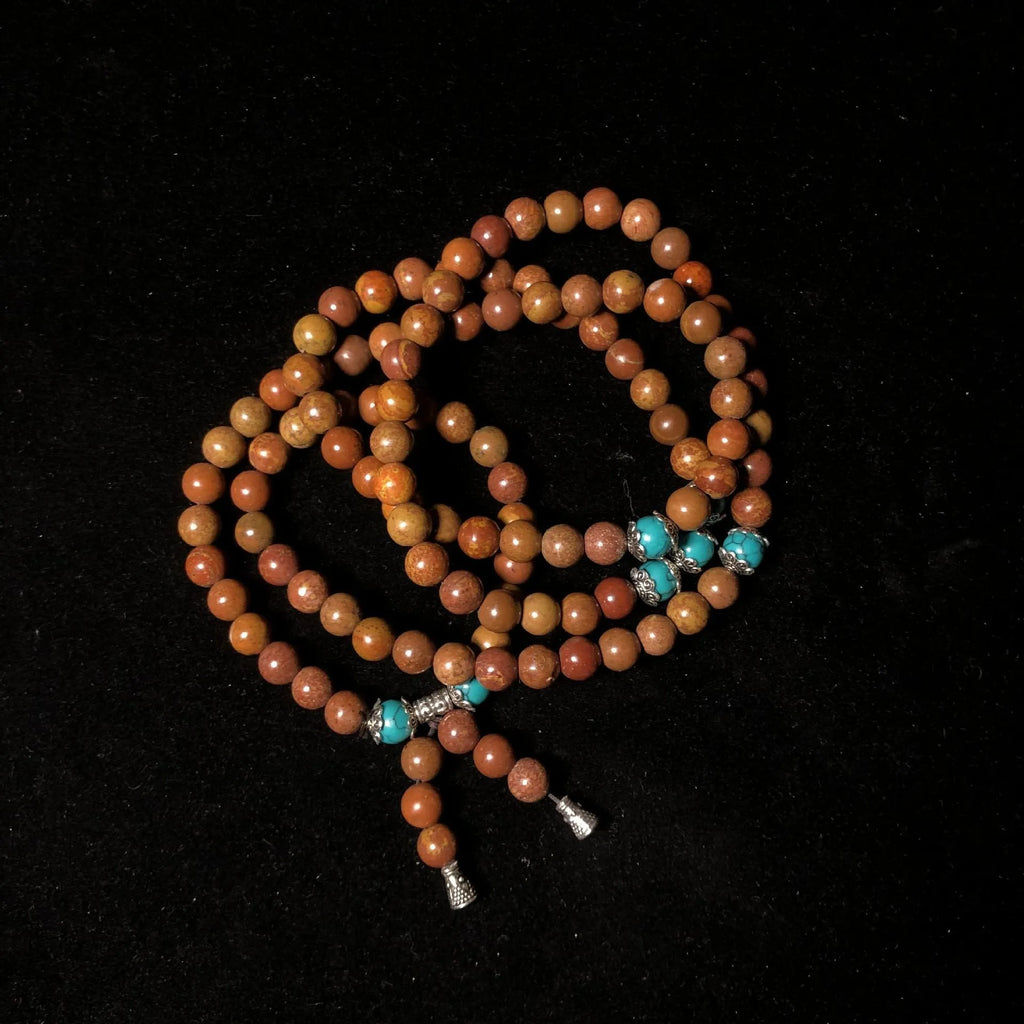 Handmade geometric stone bead bracelet with 108 Lvzhu beads measuring 5-6mm diameter