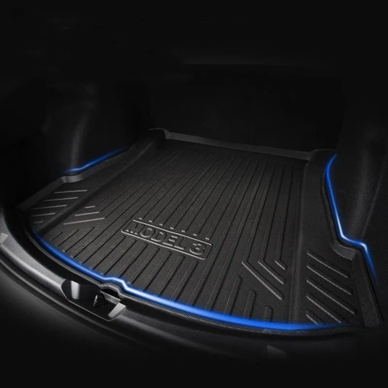 Tesla floor mats made from black rubber with textured TPE footrest section for Model 3, Y, S, and X vehicles