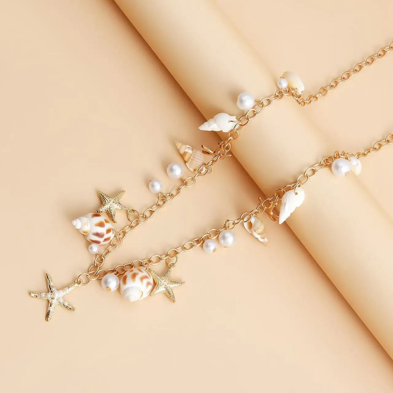 Women's summer beach waist chain and matching bracelet set with star-shaped alloy details