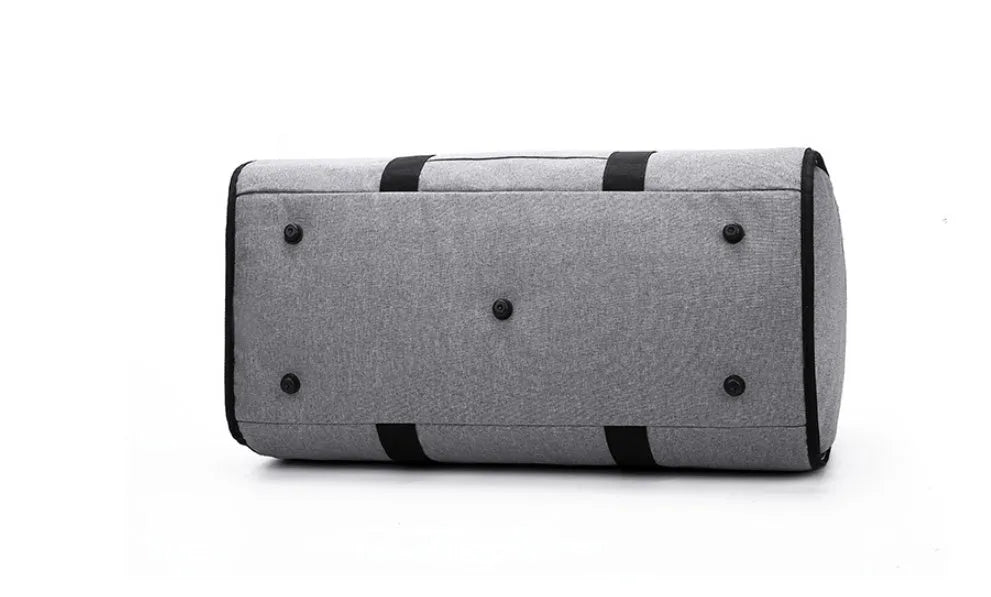 Medium-sized red cylinder travel bag made from Oxford cloth, showing zipper opening and pocket.
